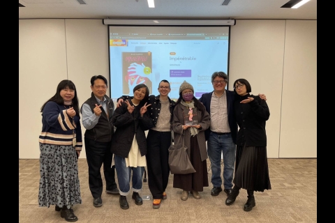 Photo d’équipe avec Alix Garin au milieu